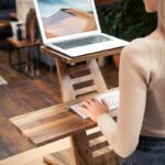 직장인 거북목·일자목, 스트레칭과 생활 습관으로 바로잡자 woman in white long sleeve shirt sitting on brown wooden chair using macbook air